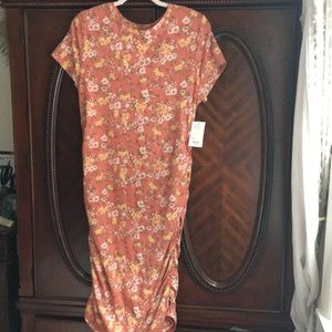 Spring T-shirt dress pulled in on the sides Color is more peach tone